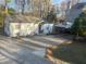Cozy bungalow with covered parking and ample driveway space at 2077 Brockett Rd, Tucker, GA 30084