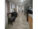 Well-lit kitchen boasting stainless steel appliances, granite countertops, and modern flooring at 2077 Brockett Rd, Tucker, GA 30084