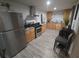 Modern kitchen featuring stainless steel appliances and granite countertops at 2077 Brockett Rd, Tucker, GA 30084