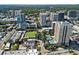 City view of multiple high-rise apartment buildings with community green space, pool and tennis at 325 E Paces Ferry Ne Rd # 907, Atlanta, GA 30305