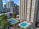 High-rise apartment building featuring a pool and tennis court at 325 E Paces Ferry Ne Rd # 907, Atlanta, GA 30305