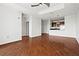 Open living area with hardwood floors leading to a kitchen with stainless steel appliances at 325 E Paces Ferry Ne Rd # 907, Atlanta, GA 30305