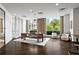 Bright, modern lobby features hardwood floors, floor to ceiling windows, and comfortable seating at 325 E Paces Ferry Ne Rd # 907, Atlanta, GA 30305