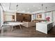 Amenity space with large island, ping pong table and lounge seating for entertaining at 325 E Paces Ferry Ne Rd # 907, Atlanta, GA 30305