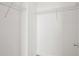 Empty walk-in closet with ample storage space, featuring white wire shelving and carpeted floor at 325 E Paces Ferry Ne Rd # 907, Atlanta, GA 30305