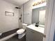 Modern bathroom featuring sleek fixtures, stand up shower and contemporary vanity at 1502 Huntingdon Chase, Atlanta, GA 30350