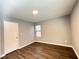 Spacious bedroom with neutral paint and hardwood flooring at 1502 Huntingdon Chase, Atlanta, GA 30350