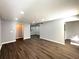 Open living space showcasing wood floors, recess lighting and neutral paint at 1502 Huntingdon Chase, Atlanta, GA 30350