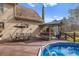 Inviting backyard features a wooden deck, pool, outdoor bar, and seating area perfect for entertaining at 3175 Pond Ridge Trl, Snellville, GA 30078