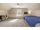 Bedroom with carpet, built-in storage, and a window for plenty of natural light at 3175 Pond Ridge Trl, Snellville, GA 30078