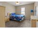 Bedroom showcasing a cozy carpeted floor and a window, creating a warm and inviting atmosphere at 3175 Pond Ridge Trl, Snellville, GA 30078