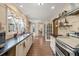 Charming kitchen featuring hardwood floors, updated countertops and stainless steel appliances at 3175 Pond Ridge Trl, Snellville, GA 30078