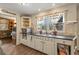 Cozy kitchen with ample counter space, custom cabinets and natural light at 3175 Pond Ridge Trl, Snellville, GA 30078