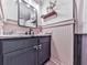 Cozy bathroom featuring a vanity with modern fixtures, decor, and beadboard at 4853 Chapelle Ct, Marietta, GA 30066