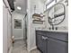 Modern bathroom with granite countertops, a stylish sink, and a glass shower door at 4853 Chapelle Ct, Marietta, GA 30066