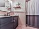 Cozy bathroom featuring a vanity with modern fixtures, decor, and beadboard at 4853 Chapelle Ct, Marietta, GA 30066