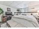 Bright, modern bedroom with an accent wall and neutral colors at 4853 Chapelle Ct, Marietta, GA 30066