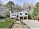Charming two-story home with a landscaped front yard and a spacious driveway at 4853 Chapelle Ct, Marietta, GA 30066