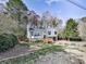 Charming two-story home with landscaped front yard, bay window, and attached garage at 4853 Chapelle Ct, Marietta, GA 30066