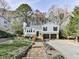 Charming two-story home with a landscaped front yard and a spacious driveway at 4853 Chapelle Ct, Marietta, GA 30066