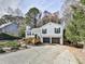 Charming home with a two-car garage, complemented by a beautifully landscaped front yard and driveway at 4853 Chapelle Ct, Marietta, GA 30066