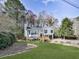 Charming two-story home with landscaped front yard, bay window, and attached garage at 4853 Chapelle Ct, Marietta, GA 30066