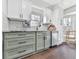 Stylish kitchen featuring modern cabinets, a stainless steel dishwasher, and plenty of counter space at 4853 Chapelle Ct, Marietta, GA 30066