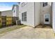 Cozy backyard features a wood fence and concrete patio at 7316 Wagon Wheel Ct, Jonesboro, GA 30236
