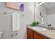 Bright bathroom featuring a granite counter, framed art and a towel rack at 7316 Wagon Wheel Ct, Jonesboro, GA 30236