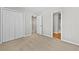 Spacious bedroom features neutral carpet, a closet, and light gray walls at 7316 Wagon Wheel Ct, Jonesboro, GA 30236