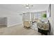 Living room area with neutral carpet, soft seating and decor at 7316 Wagon Wheel Ct, Jonesboro, GA 30236
