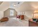 Bedroom featuring natural light, carpet flooring, and desk workspace at 994 Fairview Club Cir, Dacula, GA 30019