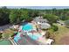 Expansive community pool and clubhouse area with multiple pools, slides, and lounging areas at 994 Fairview Club Cir, Dacula, GA 30019