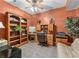 Cozy office with a built-in bookcase, desk space, and neutral colors at 994 Fairview Club Cir, Dacula, GA 30019