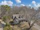 Aerial close-up shot of a two-story home with a quaint front porch at 742 Wilkes Dr, Loganville, GA 30052