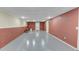 The basement offers painted concrete floors, with a block base, and access to an exterior door at 742 Wilkes Dr, Loganville, GA 30052