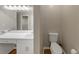 Bathroom featuring a toilet and vanity, offering all of the necessary amenities at 742 Wilkes Dr, Loganville, GA 30052
