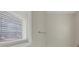 Bright bathroom featuring a window and neutral paint, creating a blank canvas for personalization and comfortable living at 742 Wilkes Dr, Loganville, GA 30052