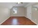 Bedroom with laminate flooring and a window that provides natural light, offering a cozy and inviting space at 742 Wilkes Dr, Loganville, GA 30052