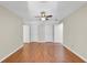 Bedroom features hardwood flooring, neutral paint, and multiple closets at 742 Wilkes Dr, Loganville, GA 30052