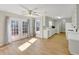 A bright kitchen with direct access to an outdoor deck through a glass patio door at 742 Wilkes Dr, Loganville, GA 30052