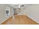 Spacious living room showcases beautiful hardwood floors and a staircase to the second level at 742 Wilkes Dr, Loganville, GA 30052