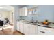 Bright kitchen boasts ample cabinet space and modern granite countertops at 1111 Clairemont Ave # P5, Decatur, GA 30030