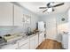Bright kitchen featuring white cabinets, granite countertops, and stainless appliances at 1111 Clairemont Ave # P5, Decatur, GA 30030