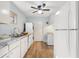 Bright kitchen featuring white cabinets, granite countertops, and stainless appliances at 1111 Clairemont Ave # P5, Decatur, GA 30030
