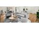 Bright living room featuring modern furniture, wood floors, and a neutral color palette at 1111 Clairemont Ave # P5, Decatur, GA 30030