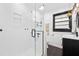 Modern bathroom with sleek glass shower, black hardware and stylish fixtures at 1672 Zemory Dr, Tucker, GA 30084