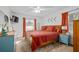 Cozy bedroom featuring a queen bed, colorful decor and a window with lots of natural light at 1672 Zemory Dr, Tucker, GA 30084