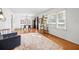 Bright living room with hardwood floors and natural light from large windows at 1672 Zemory Dr, Tucker, GA 30084
