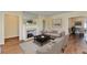 Comfortable living room showcasing hardwood floors, a fireplace, and neutral-toned furniture for relaxation at 1926 N Decatur Ne Rd, Atlanta, GA 30307